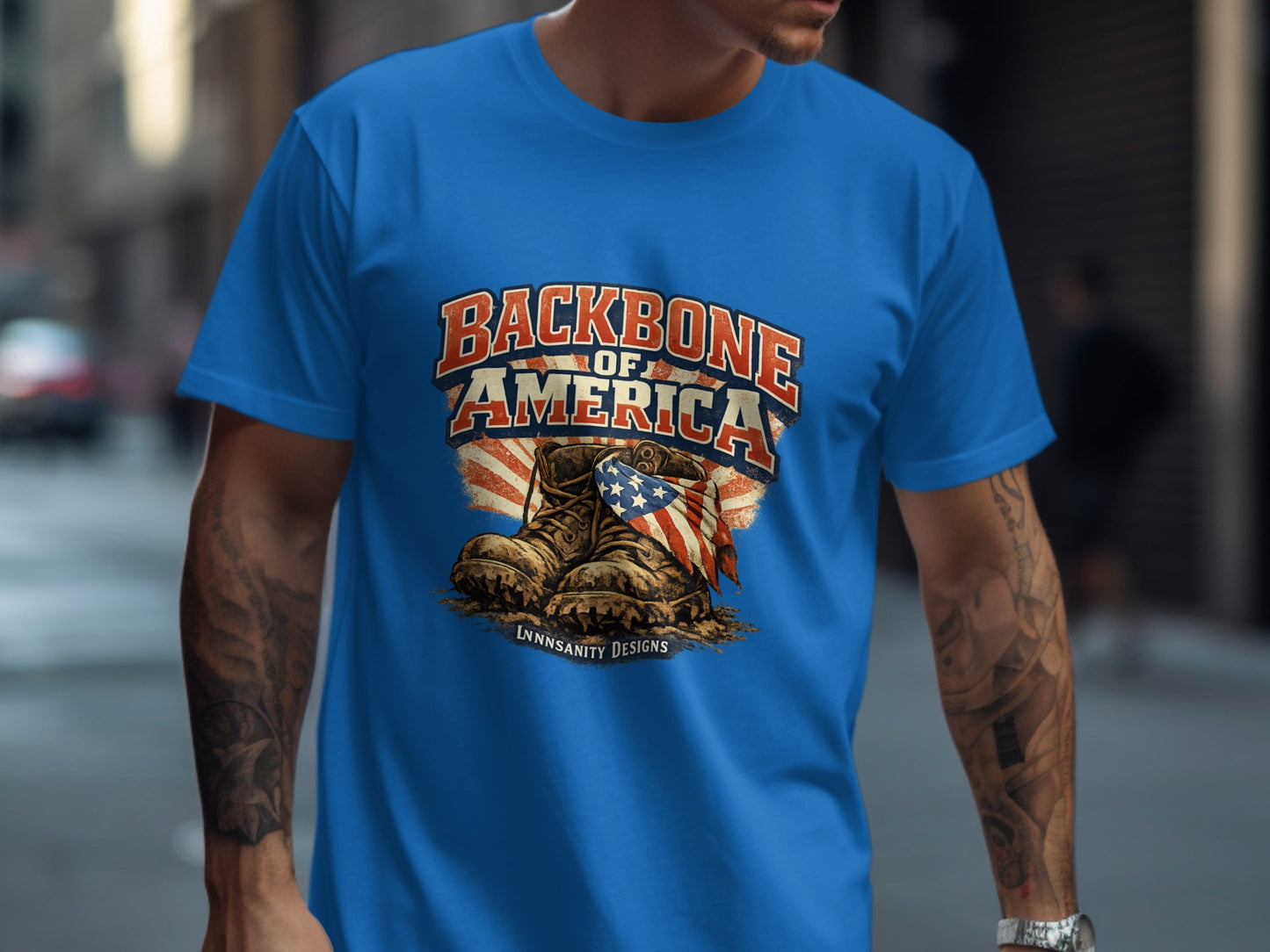 Blue t-shirt with "Backbone of America" text and combat boots with US flag.