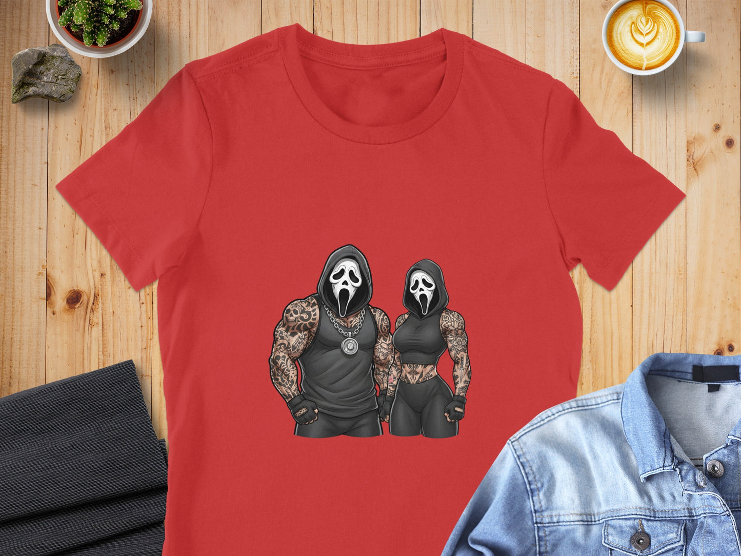 Two figures in Scream masks, one muscular, wearing red t-shirts.