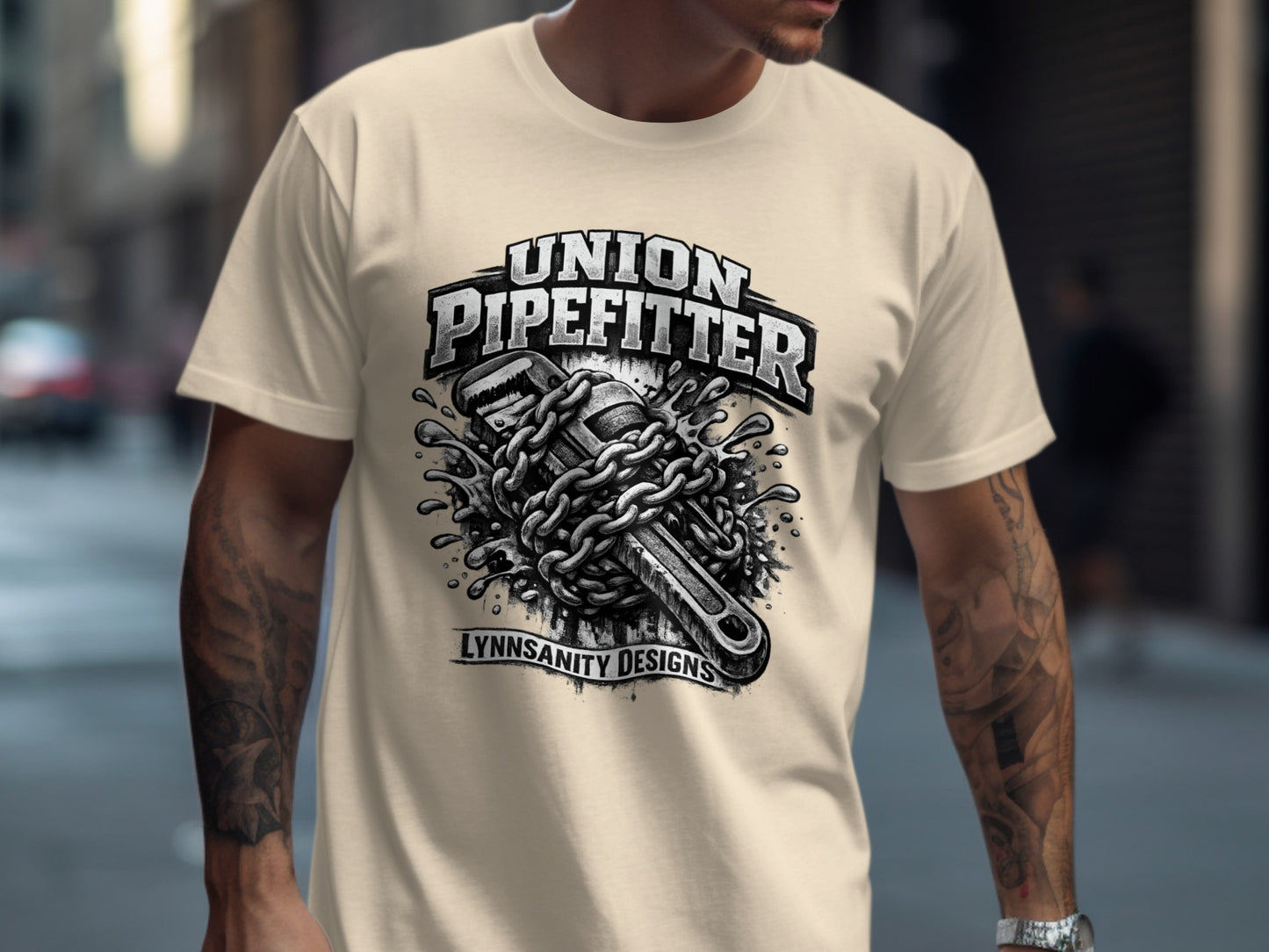 Union Pipefitter graphic tee with wrench and chains.